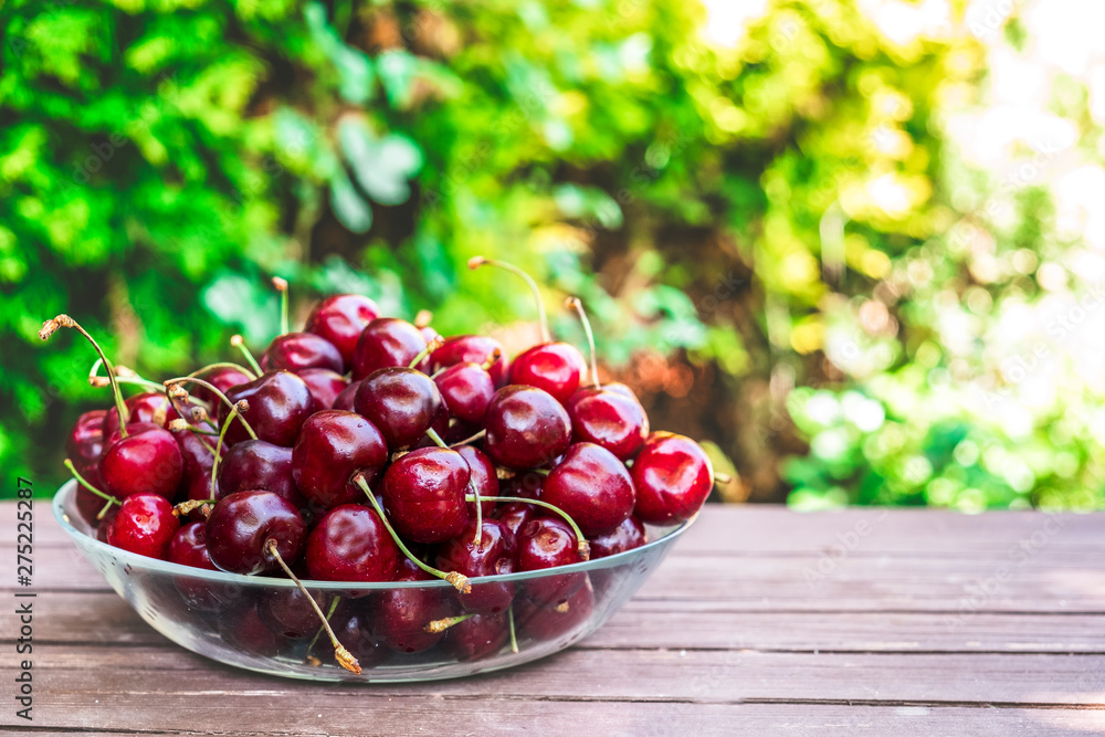 Ripe sweet cherry in a glass bowl. Copy space Ripe sweet cherry in a glass bowl. Copy space