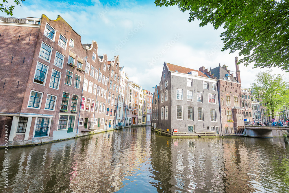View of Canals, Houses and Boats in Amsterdam, Holland, Netherlands