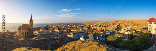 Luderitz in Namibia with lutheran church called Felsenkirche at sunset
