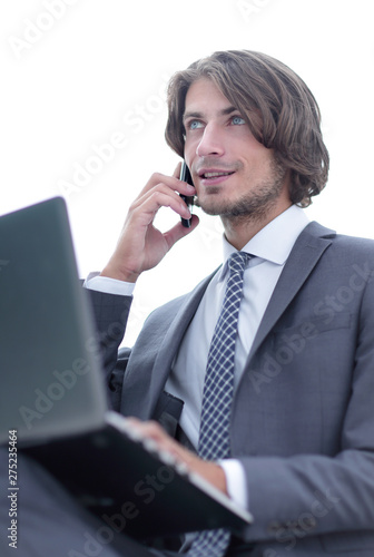 closeup.serious businesswoman talking on the smartphone