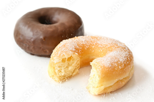 Canvas-taulu Glazed donut and chocolate donut on white background - isolated