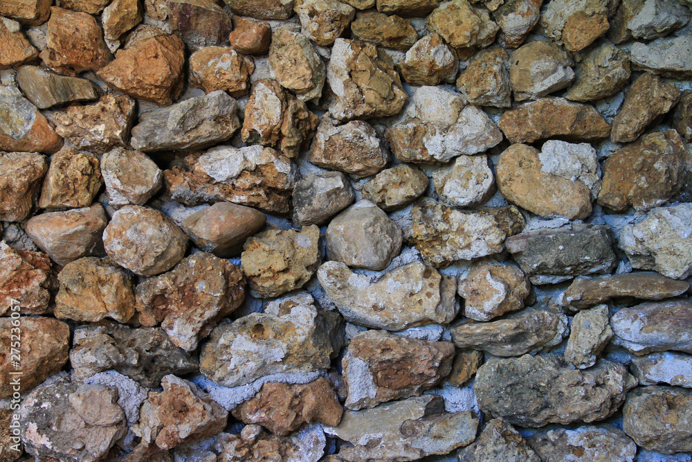 stone wall texture. A stone wall of house make by hand for background or texture.