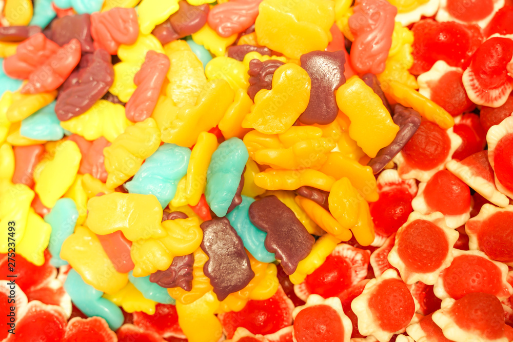 delicious multi-colored fruit marmalade. unhealthy bright candies in bulk. different jelly photo close. tasty sweets in the candy shop. nobody. delicious multi-colored fruit marmalade. unhealthy bright candies in bulk. different jelly photo close. tasty sweets in the candy shop. nobody.
