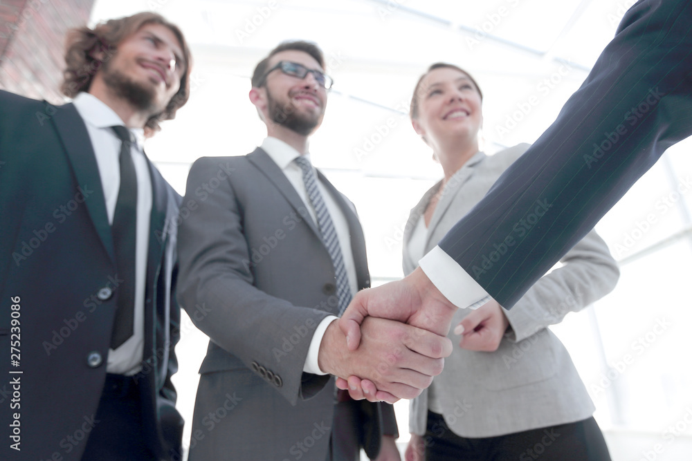 business leader shaking hands with the investor business leader shaking hands with the investor