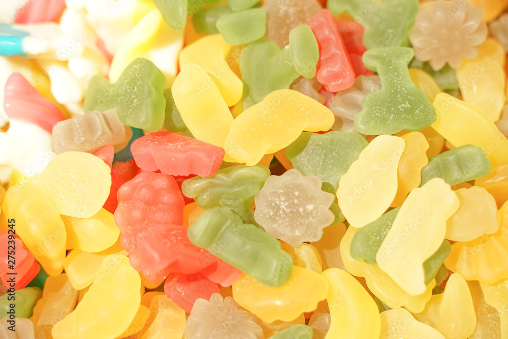 delicious multi-colored fruit marmalade. unhealthy bright candies in bulk. different jelly photo close. tasty sweets in the candy shop. nobody. delicious multi-colored fruit marmalade. unhealthy bright candies in bulk. different jelly photo close. tasty sweets in the candy shop. nobody.