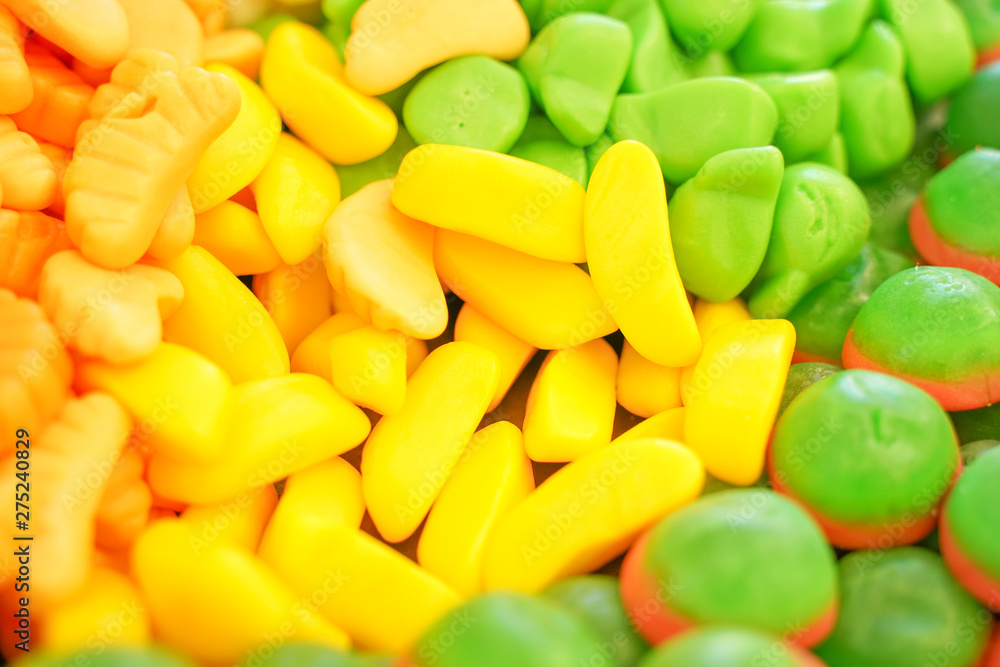delicious multi-colored fruit marmalade. unhealthy bright candies in bulk. different jelly photo close. tasty sweets in the candy shop. nobody. delicious multi-colored fruit marmalade. unhealthy bright candies in bulk. different jelly photo close. tasty sweets in the candy shop. nobody.