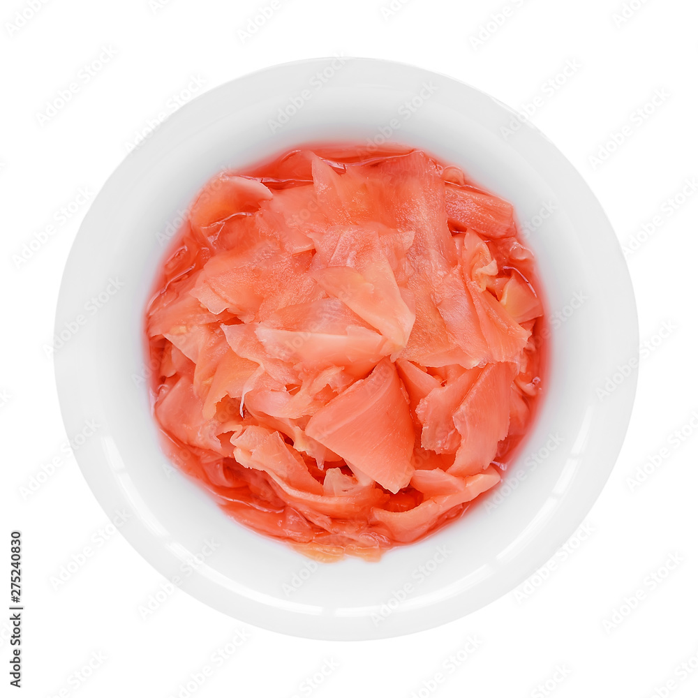 Pink pickled ginger in a white porcelain bowl isolated on a white background. Traditional Japanese condiment for sushi. Healthy eating. Pink pickled ginger in a white porcelain bowl isolated on a white background. Traditional Japanese condiment for sushi. Healthy eating.