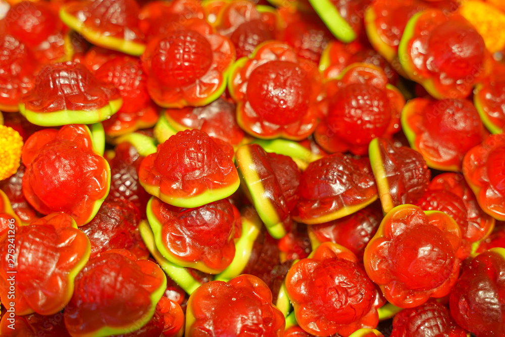 delicious multi-colored fruit marmalade. unhealthy bright candies in bulk. different jelly photo close. tasty sweets in the candy shop. nobody. delicious multi-colored fruit marmalade. unhealthy bright candies in bulk. different jelly photo close. tasty sweets in the candy shop. nobody.