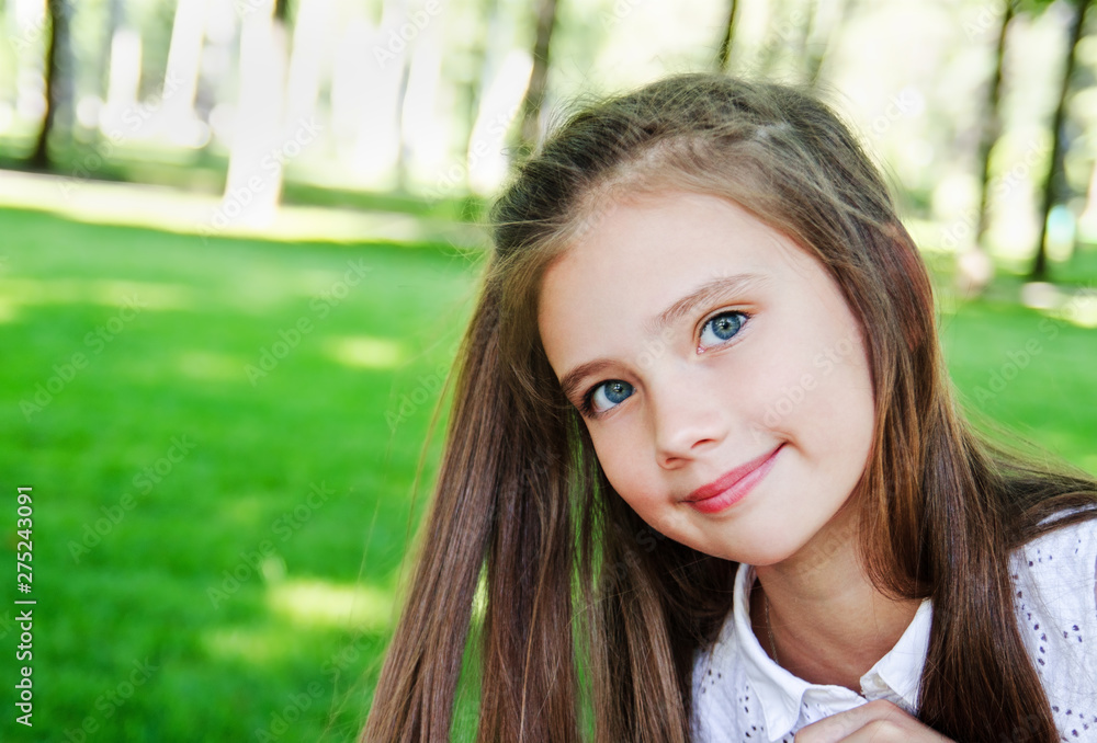 Portrait of adorable smiling little girl child schoolgirl teenager outdoors Portrait of adorable smiling little girl child schoolgirl teenager outdoors