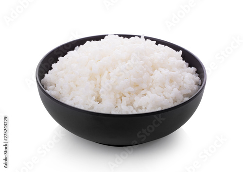 Fényképezés Rice in a black bowl isolated on a white background