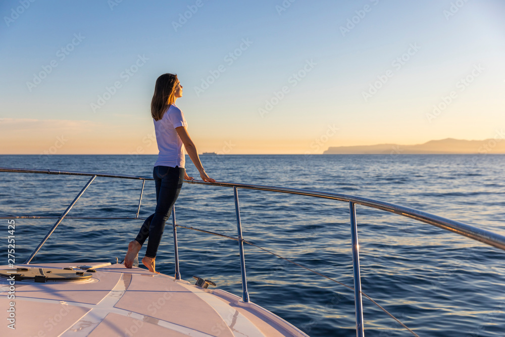 Fototapeta premium happy woman on the yacht