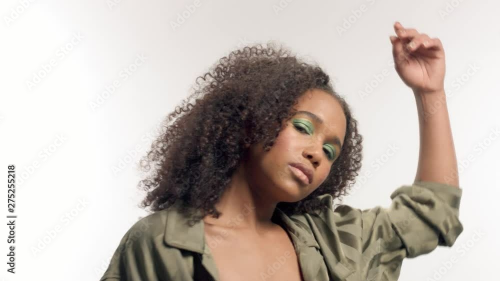 closeup dancing mixed race model with bright eye makeup closeup dancing mixed race model with bright eye makeup