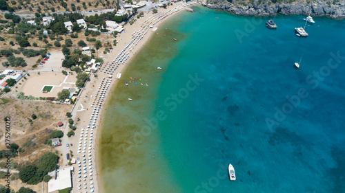 Aerial drone photo of paradise organised with sun beds and umbrellas. Beautiful turquoise water. 