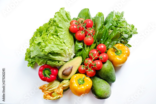 Clean healthy eating habits concept. Fruits  herbs  greens   vegetables mix  colorful juicy organic detox smoothie juice ingredients  white background. Vegan vegetarian diet food. Flat lay  copy space