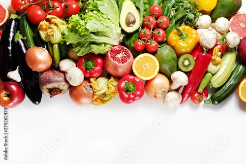 Clean healthy eating habits concept. Fruits  herbs  greens   vegetables mix  colorful juicy organic detox smoothie juice ingredients  white background. Vegan vegetarian diet food. Flat lay  copy space