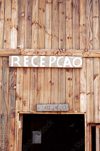 Different views of a wooden house.