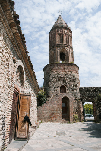 Ancient stone tower in the Georgian city of Sighnaghi, ancient architecture, Georgian attractions,