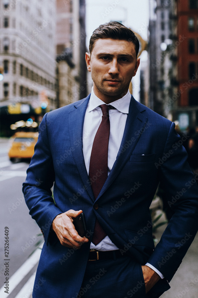 Successful serious man looks confidently in the camera Successful serious man looks confidently in the camera