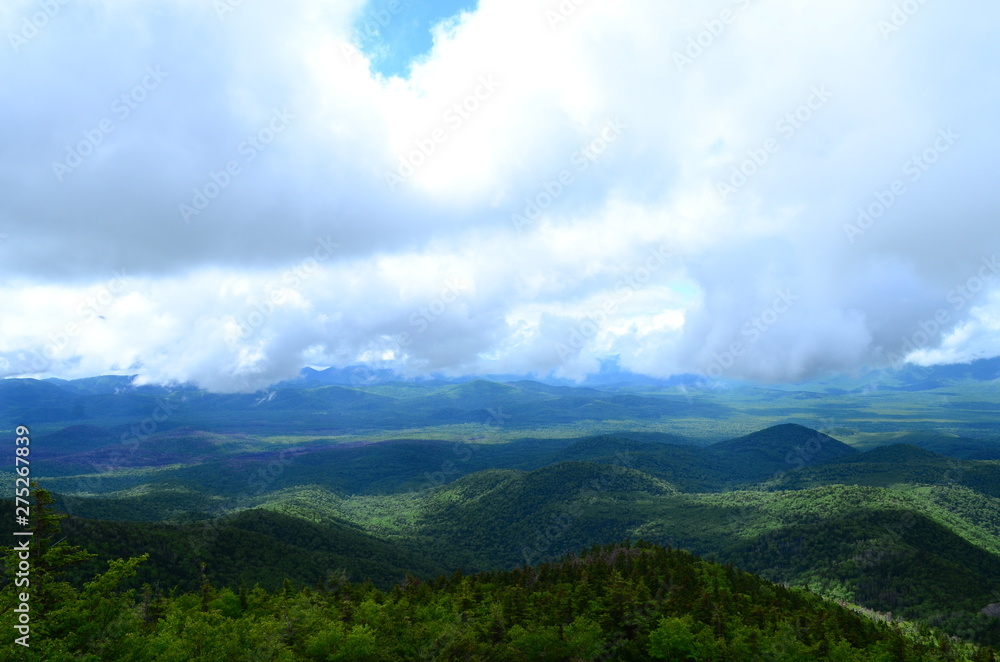 Naklejka premium landscape with mountains and clouds