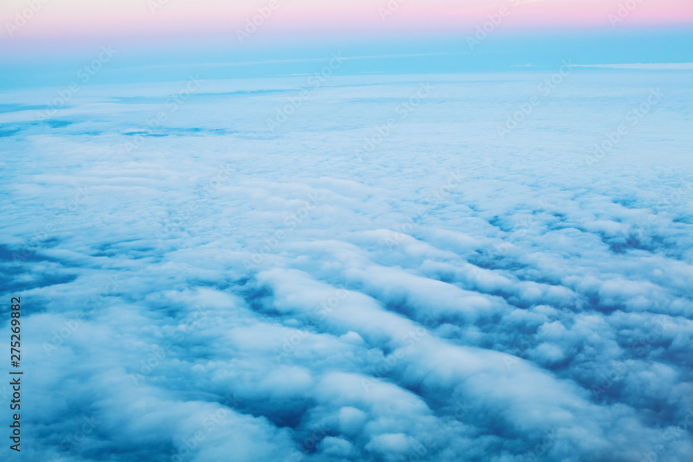 Blue sky clouds background. Sky above. Beautiful landscape with clouds and dawn