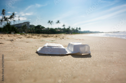 Plastic food box trash pollution on the sandy beach in Vietnam © Karolciesluk