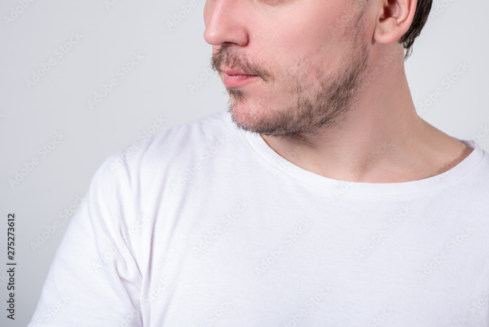 Handsome man with stubble or beard on face close up Handsome man with stubble or beard on face close up