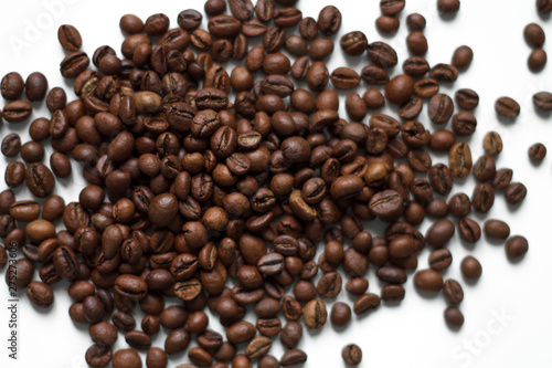 coffee beans brown on white isolated background with close-up location with blurred background