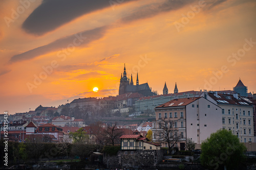 Scenic Panorama of the Old Town Architecture with Vltava River, Charles Bridge and St.Vitus Cathedral in Prague, Czech Republic, Sunset Time