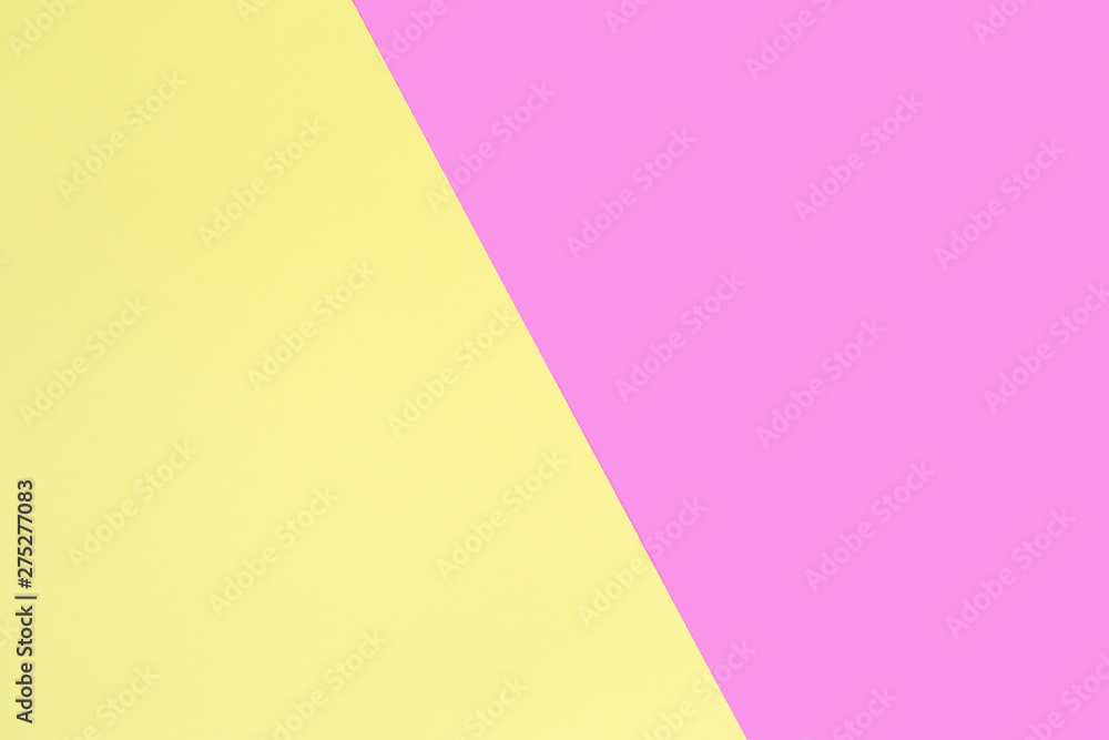 Sheets of pink and yellow paper. Plain without pattern.