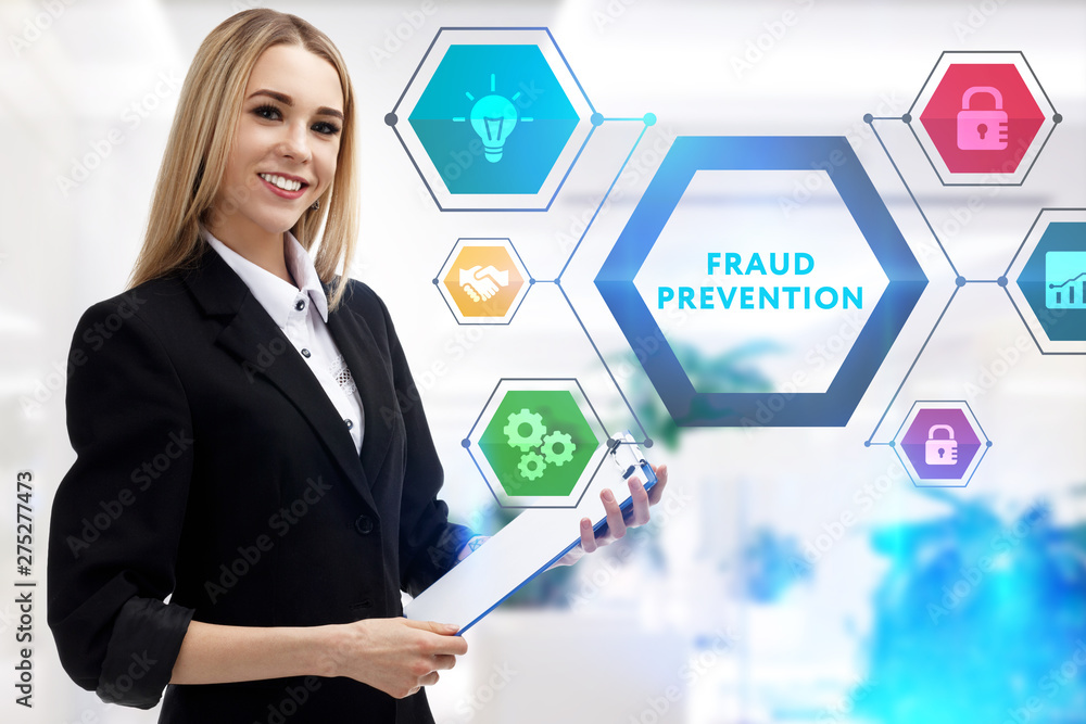 The concept of business, technology, the Internet and the network. A young entrepreneur working on a virtual screen of the future and sees the inscription: Fraud prevention The concept of business, technology, the Internet and the network. A young entrepreneur working on a virtual screen of the future and sees the inscription: Fraud prevention