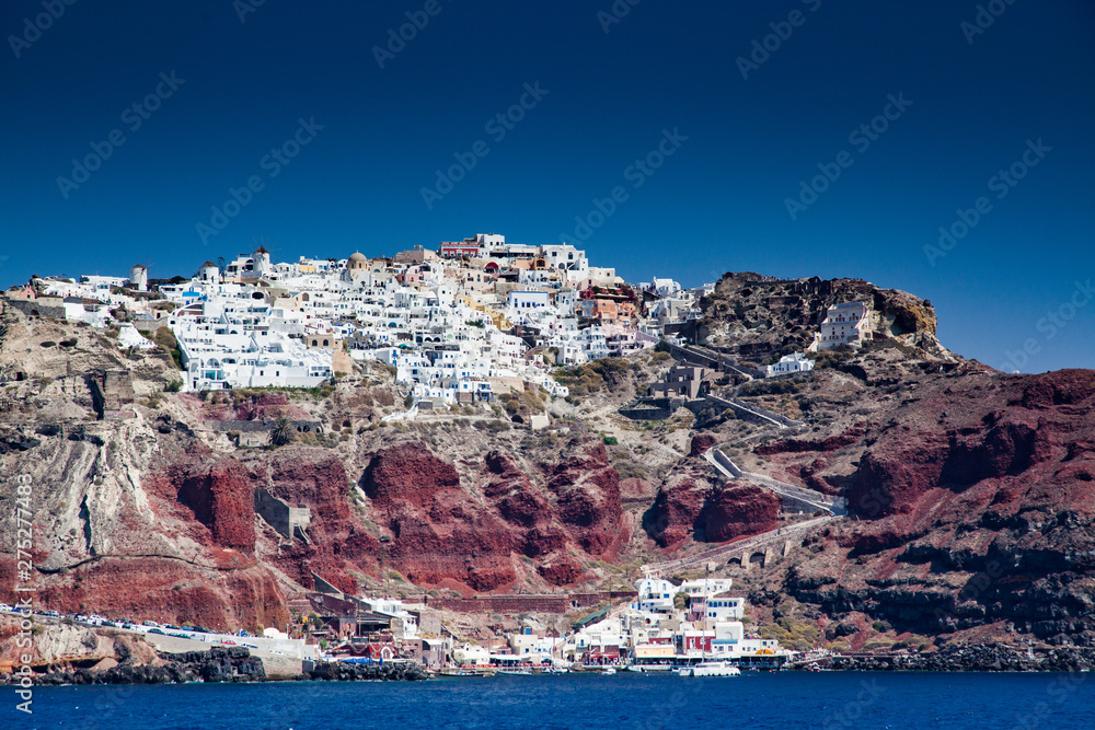 view of the caldera and Oia in Santorini from the sea, Cyclades islands Greece - amazing travel destination