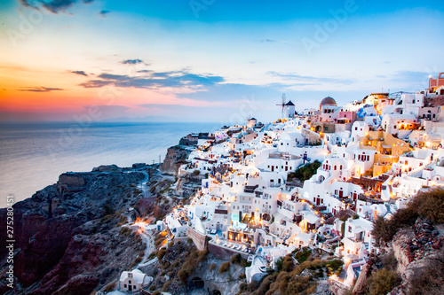 amazing view of Oia town at sunset in Santorini, Cyclades islands Greece - amazing travel destination