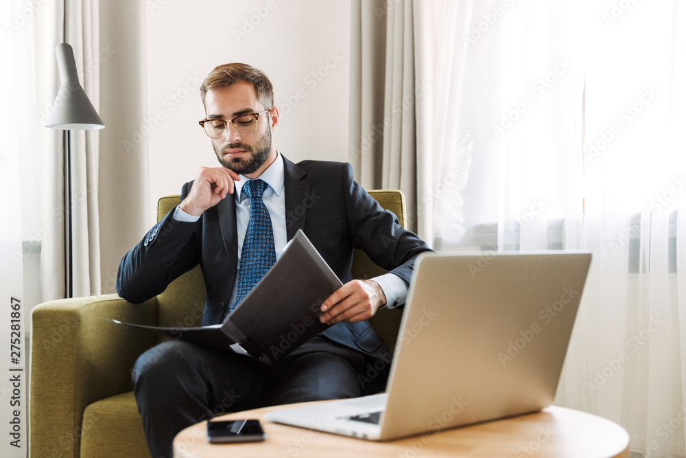 Attractive young businessman wearing suit Attractive young businessman wearing suit