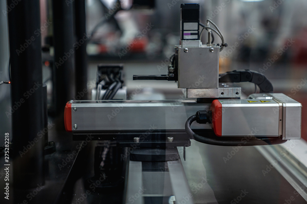 automation machine and detail close up in machine automatic with robotic automation technology for technology production factory automation machine and detail close up in machine automatic with robotic automation technology for technology production factory
