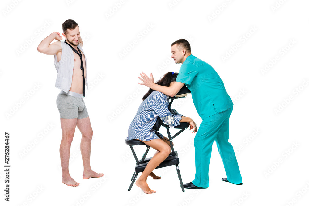 Obraz premium The theme relaxation and rest in office. The queue of employees will be waiting for a massage at the invited specialist. Head and neck massage on the chair. Cheerful Caucasian man in shorts and tie