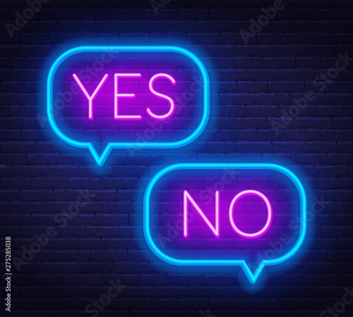 Neon sign yes and no on dark background.
