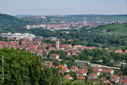 Beautiful scenic view from nearby the Rasthaus Würzburg Nord over the city of Würzburg with the Fortress Marienberg in the middle of the background © franconiaphoto