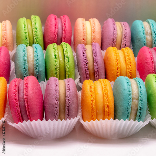 Delicious colored macaroons in an assortment on a white background