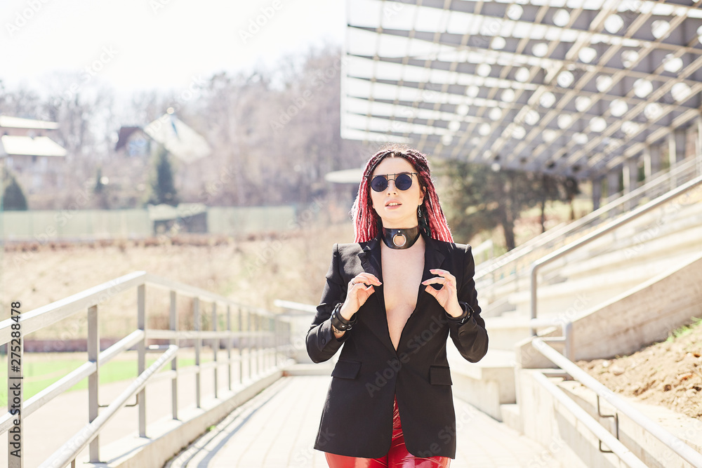 Stylish girl is photographed at the stadium Stylish girl is photographed at the stadium