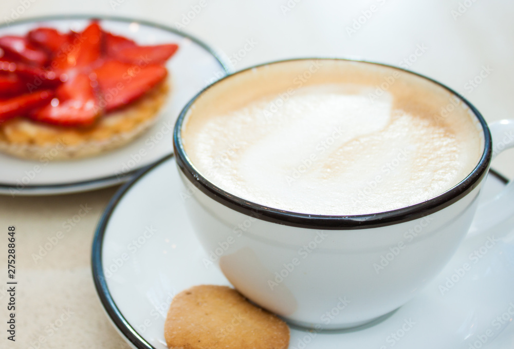 Cappuccino and strawberry tart. Cappuccino and strawberry tart.