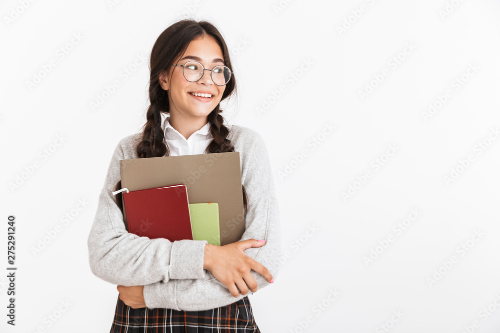 Attractive schoolgirl wearing unifrom standing Attractive schoolgirl wearing unifrom standing