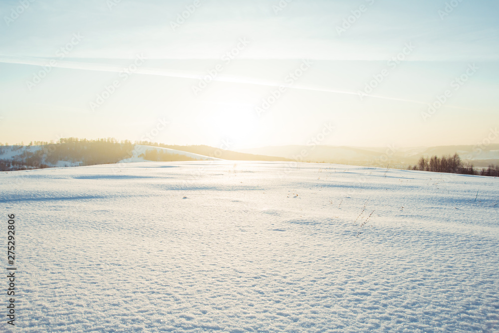evening winter landscape. beautiful field in the snow. evening winter landscape. beautiful field in the snow.