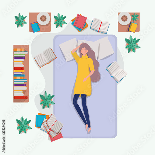 young woman relaxing in mattress in the bedroom