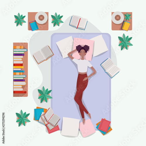 young afro woman relaxing in mattress in the bedroom