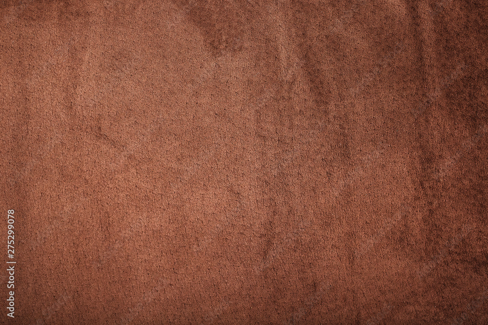 Brown velor textural background pattern. Gorgeous elastic velor fabric has a velvet pile, shine and texture. Brown velor textural background pattern. Gorgeous elastic velor fabric has a velvet pile, shine and texture.