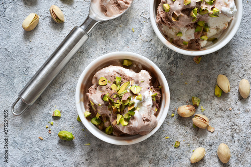 Chocolate, vanilla ice cream with pistachios. View from above.