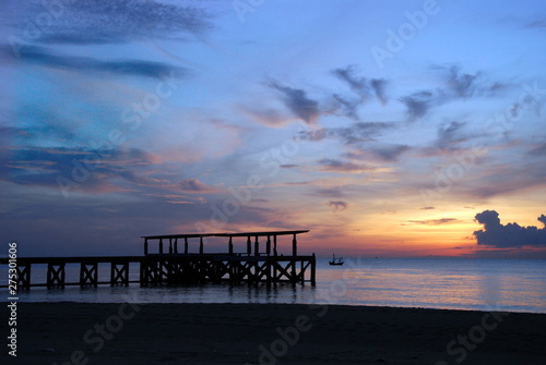 Pier with sunrise light at Pranburi