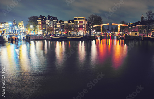 Amsterdam at night, the Netherlands. © badahos