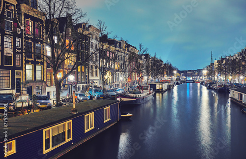 Amsterdam at night, the Netherlands. © badahos