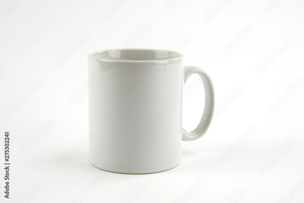 Blank white mug on isolated white background Blank white mug on isolated white background